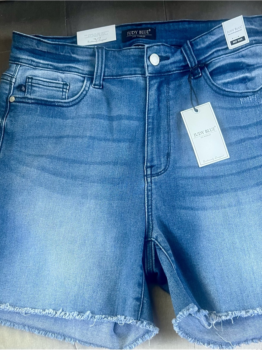 Judy Blue Light Blue Denim Mid Rise Shorts with Frayed Hem